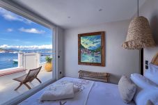 Bright bedroom with sea view