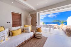 View from a living room to a terrace and the sea