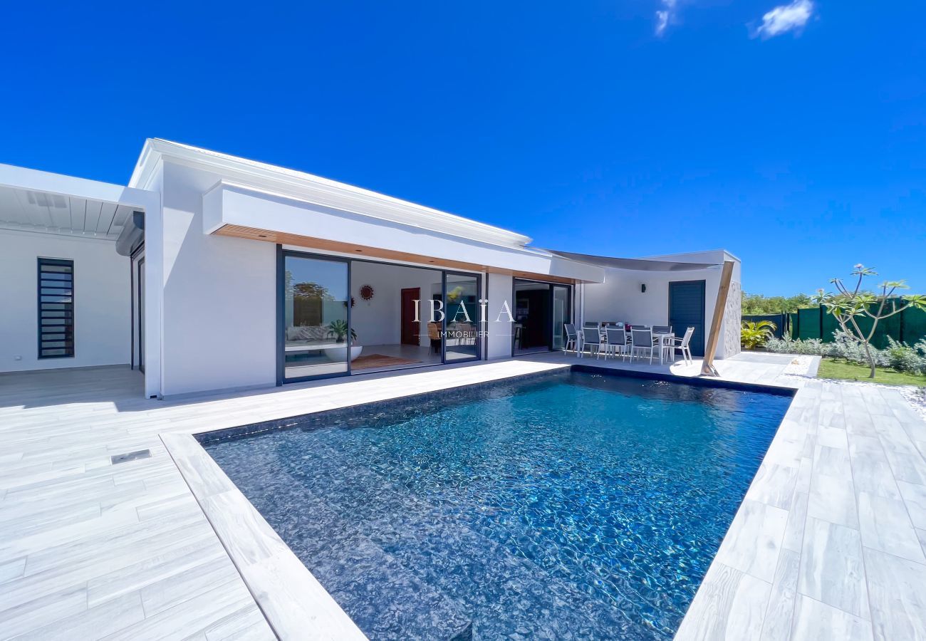 White villa and pool