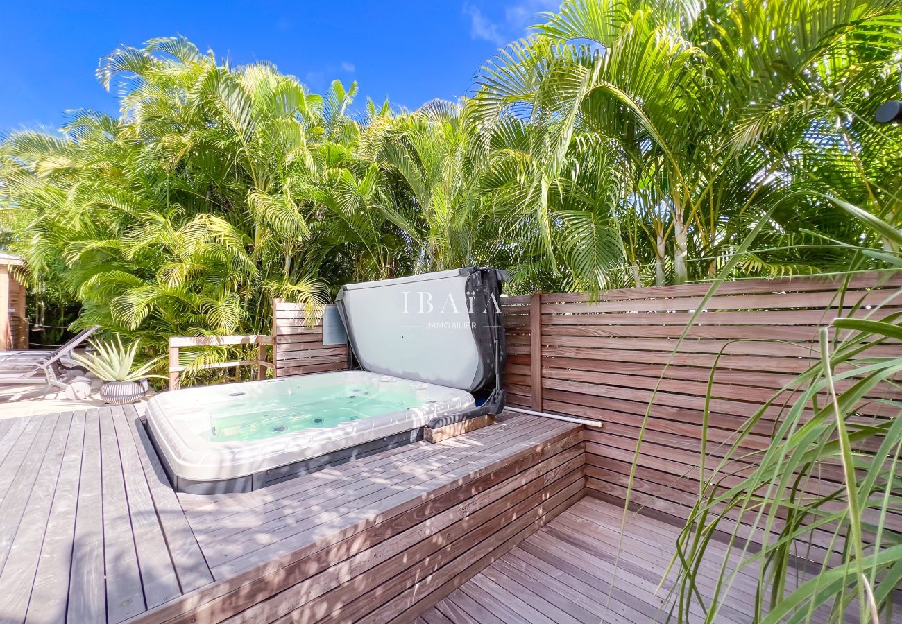 Outdoor jacuzzi on wooden deck