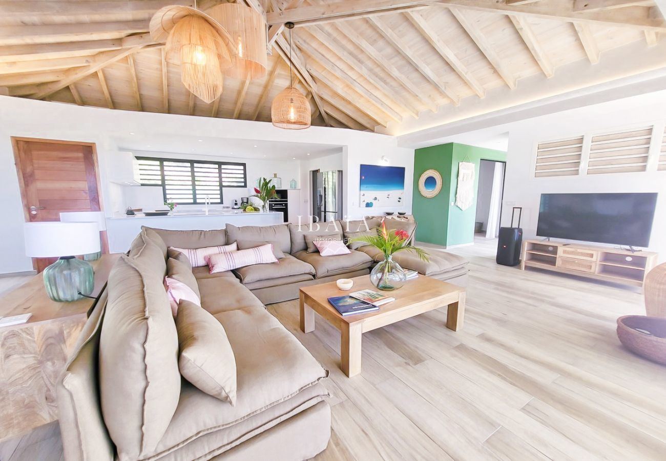 Bright dining room overlooking terrace and pool